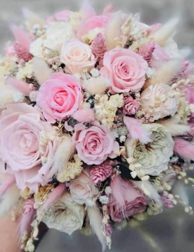 Flower bouquet in pale pink fresh flowers enhanced with some dried flowers, a really pretty style