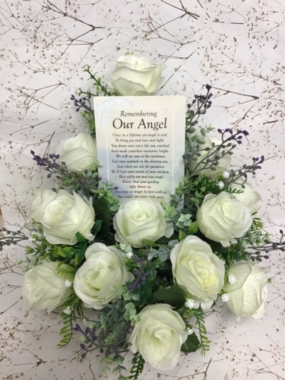 memory design in white roses suitable for a child's memory tribute